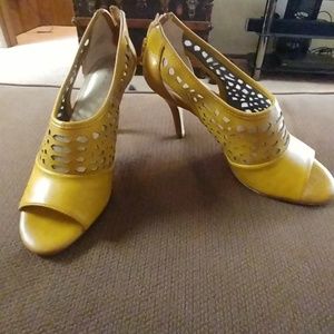 Mustard colored peep toe heels
